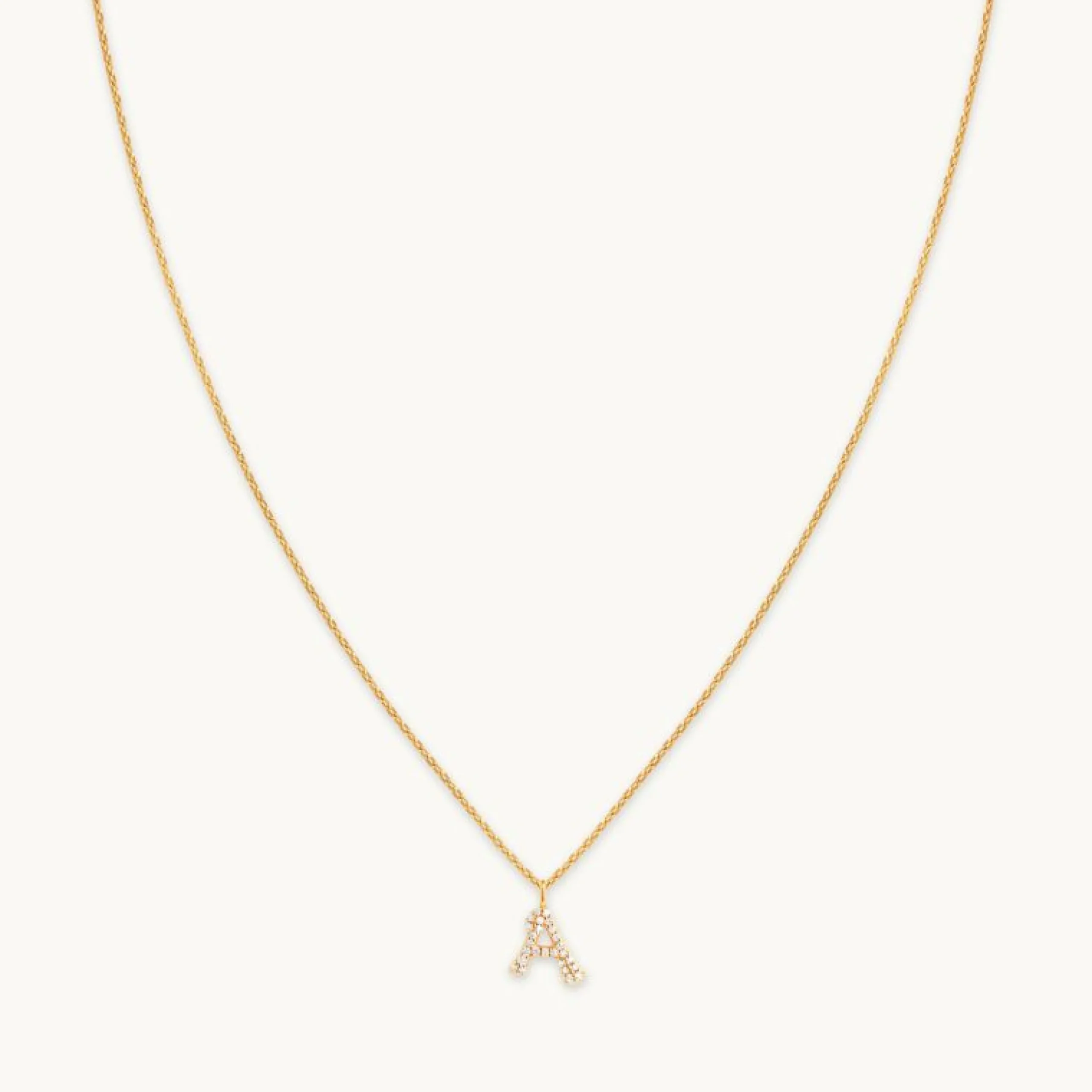 a_initial_pav_pendant_nec_0.webp A Initial Pavé Pendant Necklace in Gold