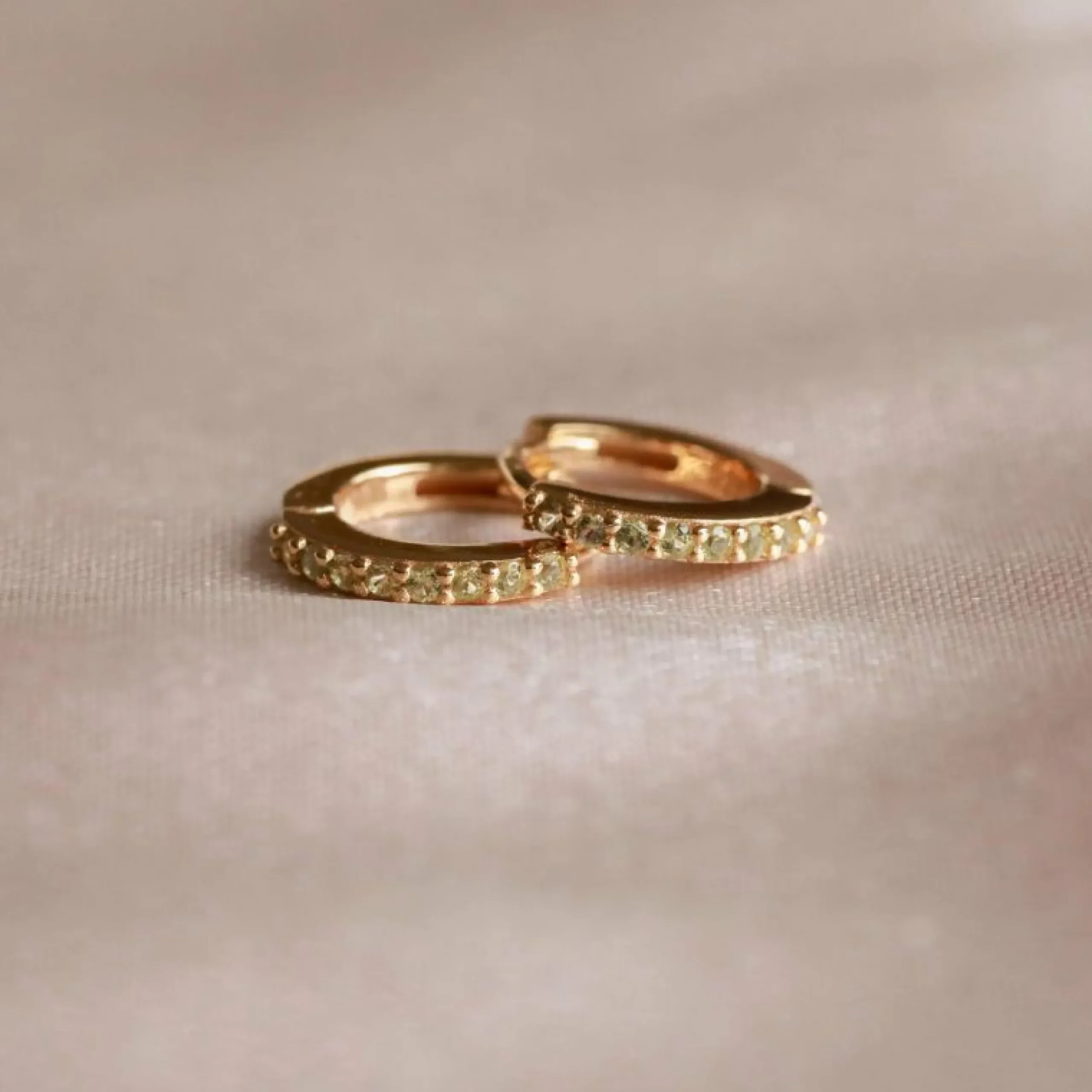 august_birthstone_huggies_2.webp August Birthstone Huggies in Gold with Peridot CZ