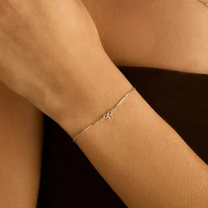 Bow Charm Bracelet in Solid White Gold