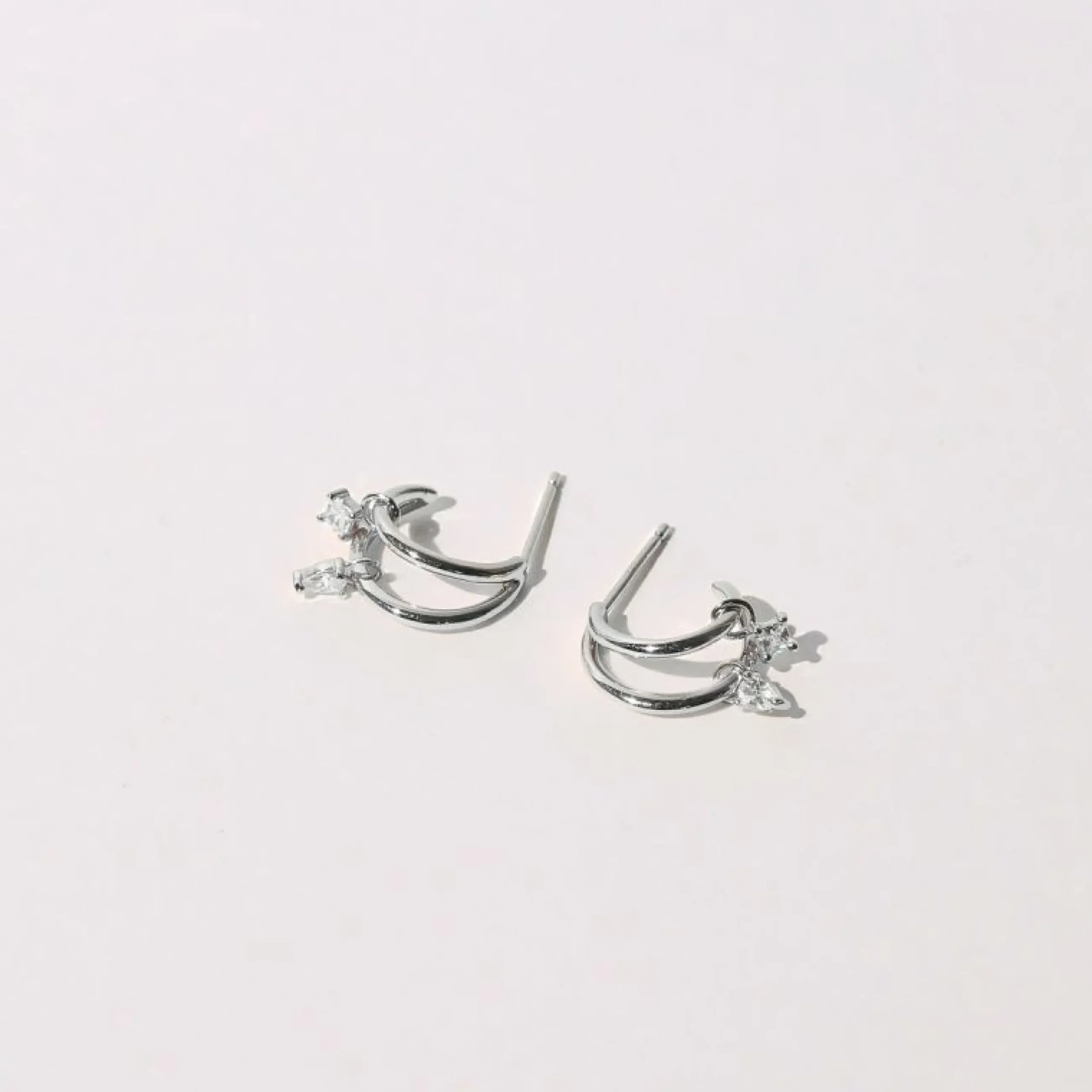 celestial_crystal_huggies_2.webp Celestial Crystal Huggies in Silver