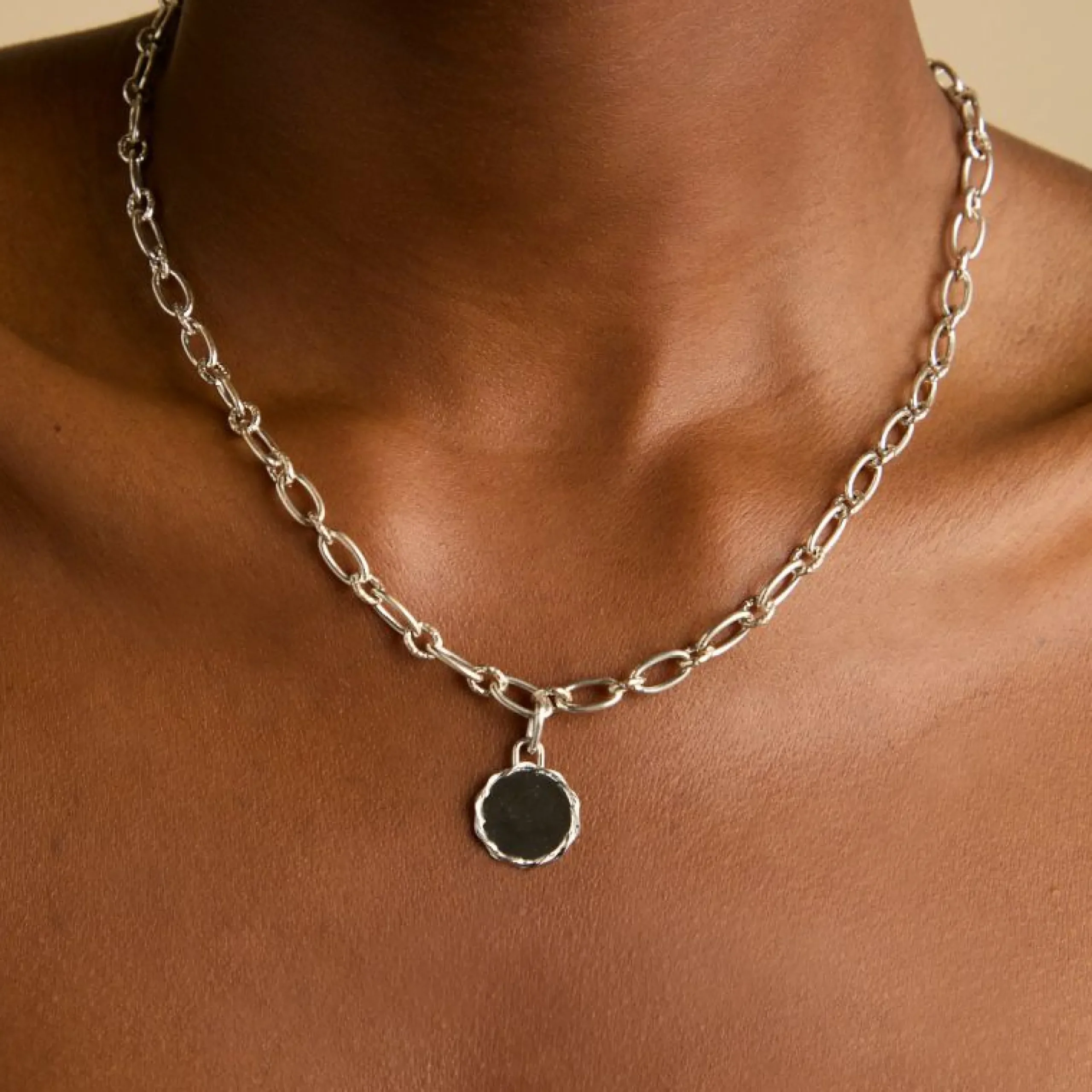 coin_talisman_charm_in_si_1.webp Coin Talisman Charm in Silver