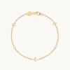 Cosmic Star Charm Bracelet in Gold