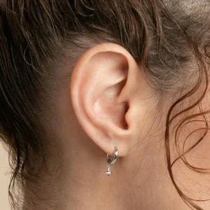 Cosmic Star Charm Huggies in Silver