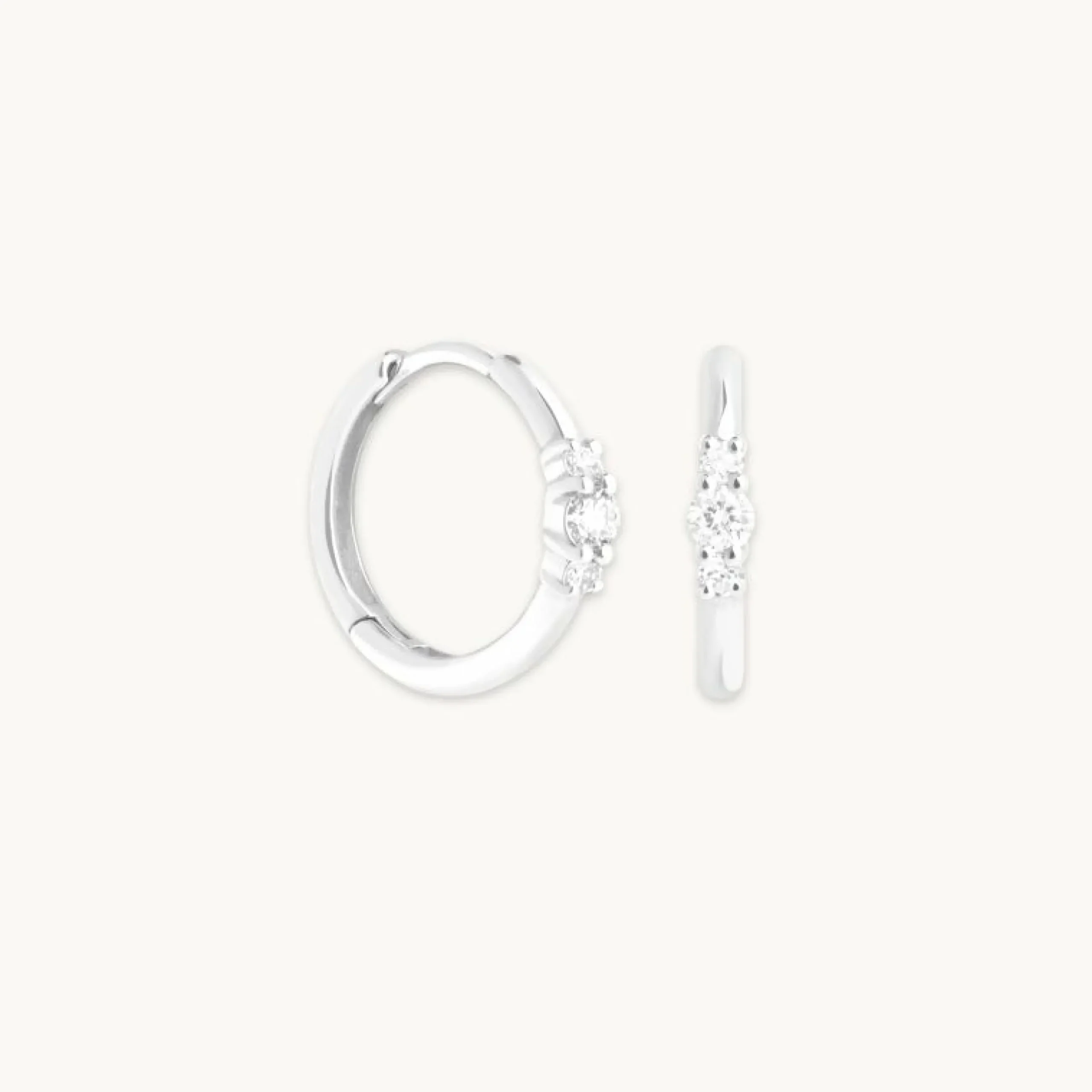 diamond_trilogy_hoops_in__0-1.webp Diamond Trilogy Hoops in Solid White Gold