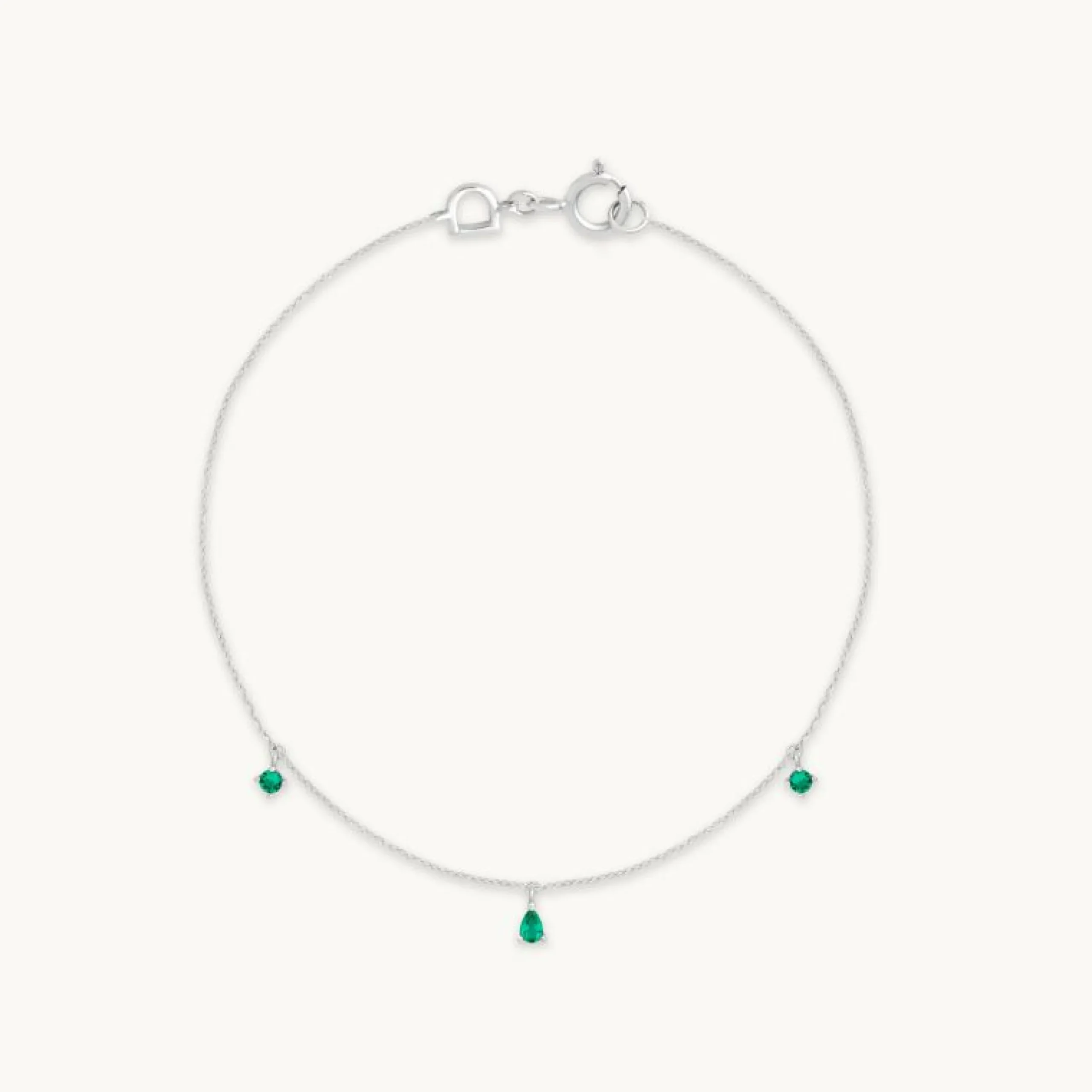 emerald_charm_bracelet_in_0-1.webp Emerald Charm Bracelet in Solid White Gold