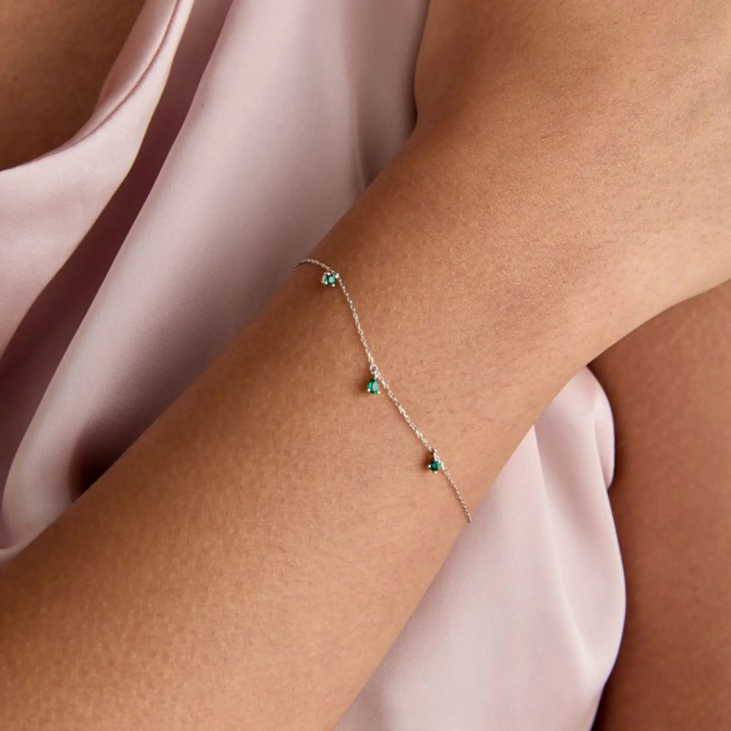 emerald_charm_bracelet_in_1-1.webp Emerald Charm Bracelet in Solid White Gold