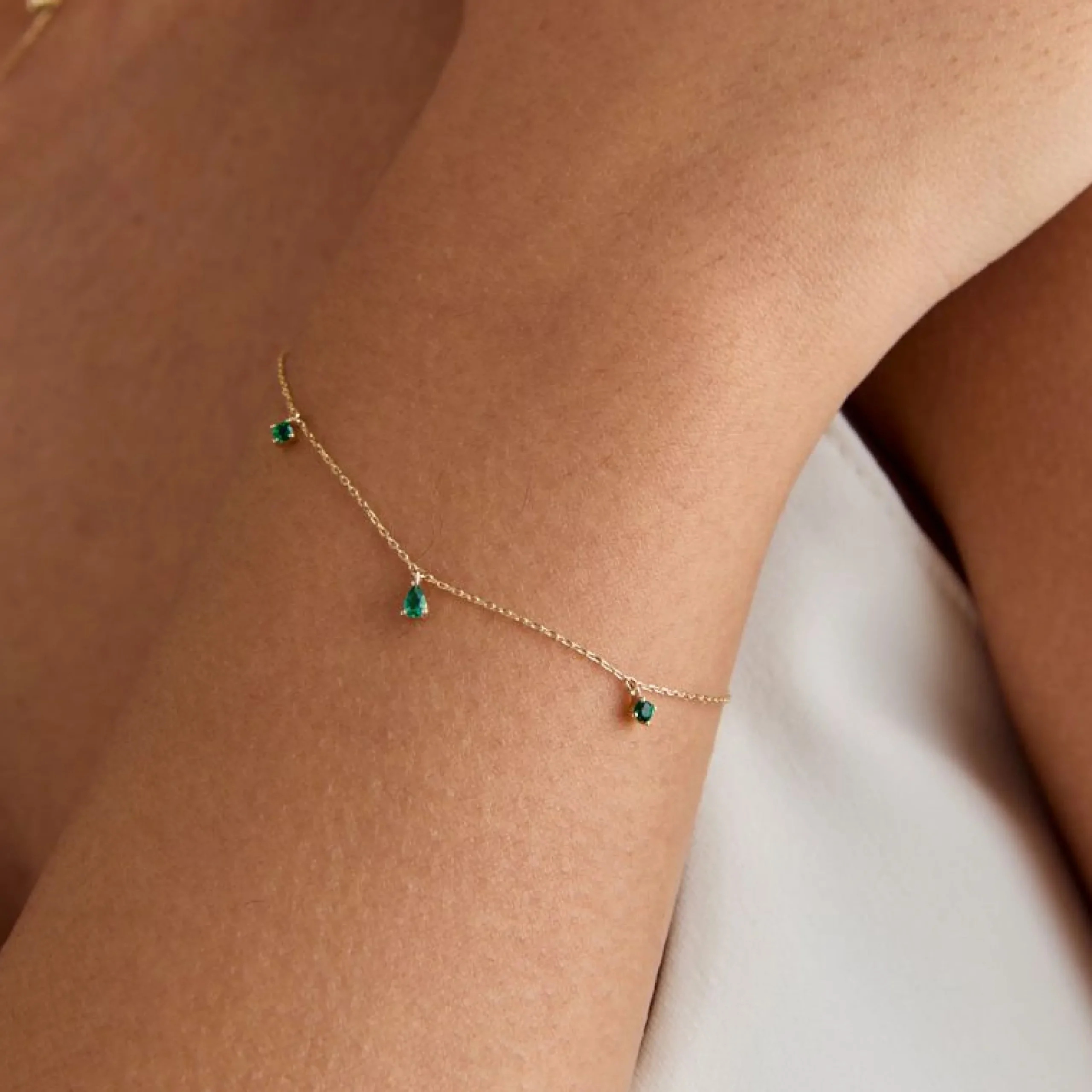 emerald_charm_bracelet_in_1.webp Emerald Charm Bracelet in Solid Gold