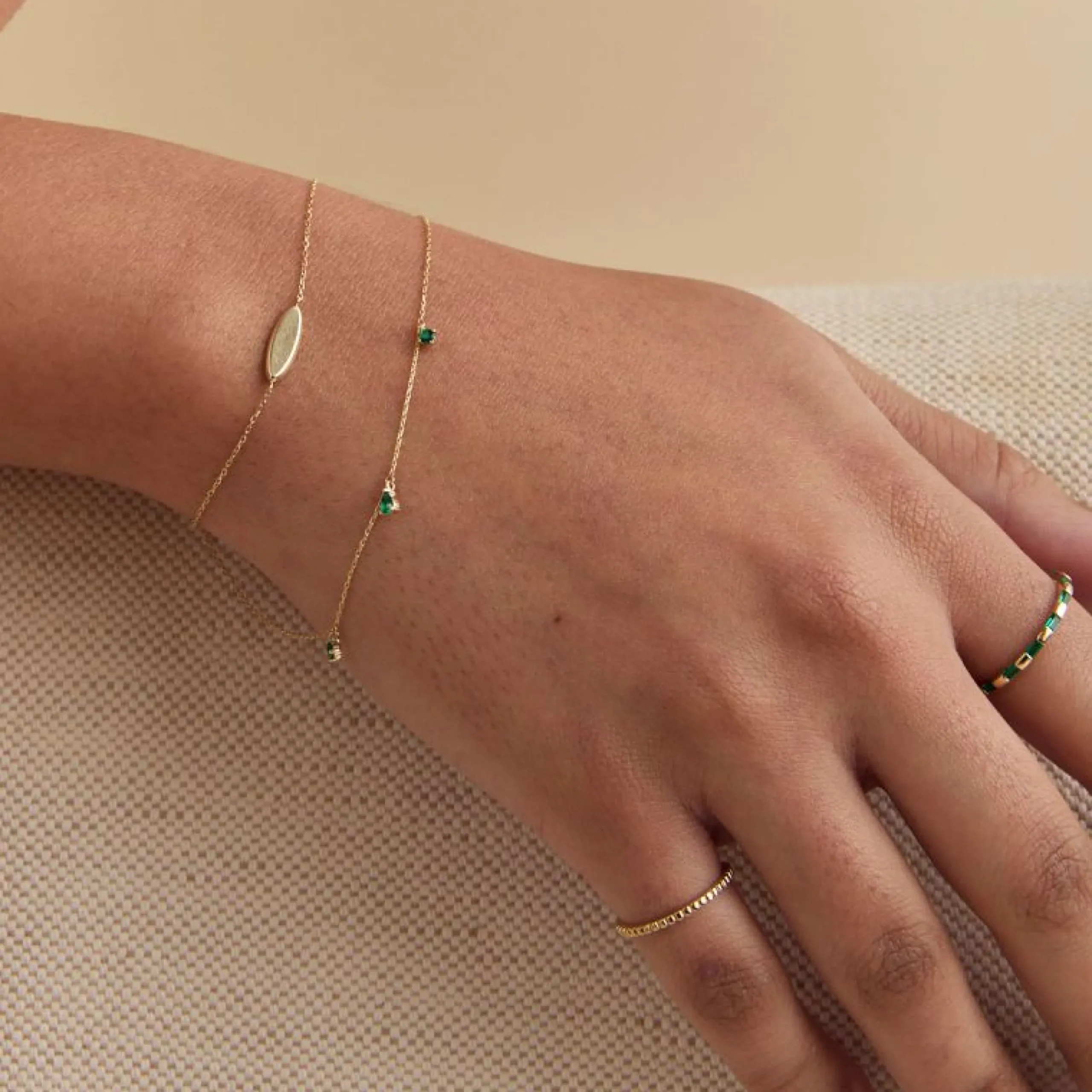 emerald_charm_bracelet_in_2.webp Emerald Charm Bracelet in Solid Gold