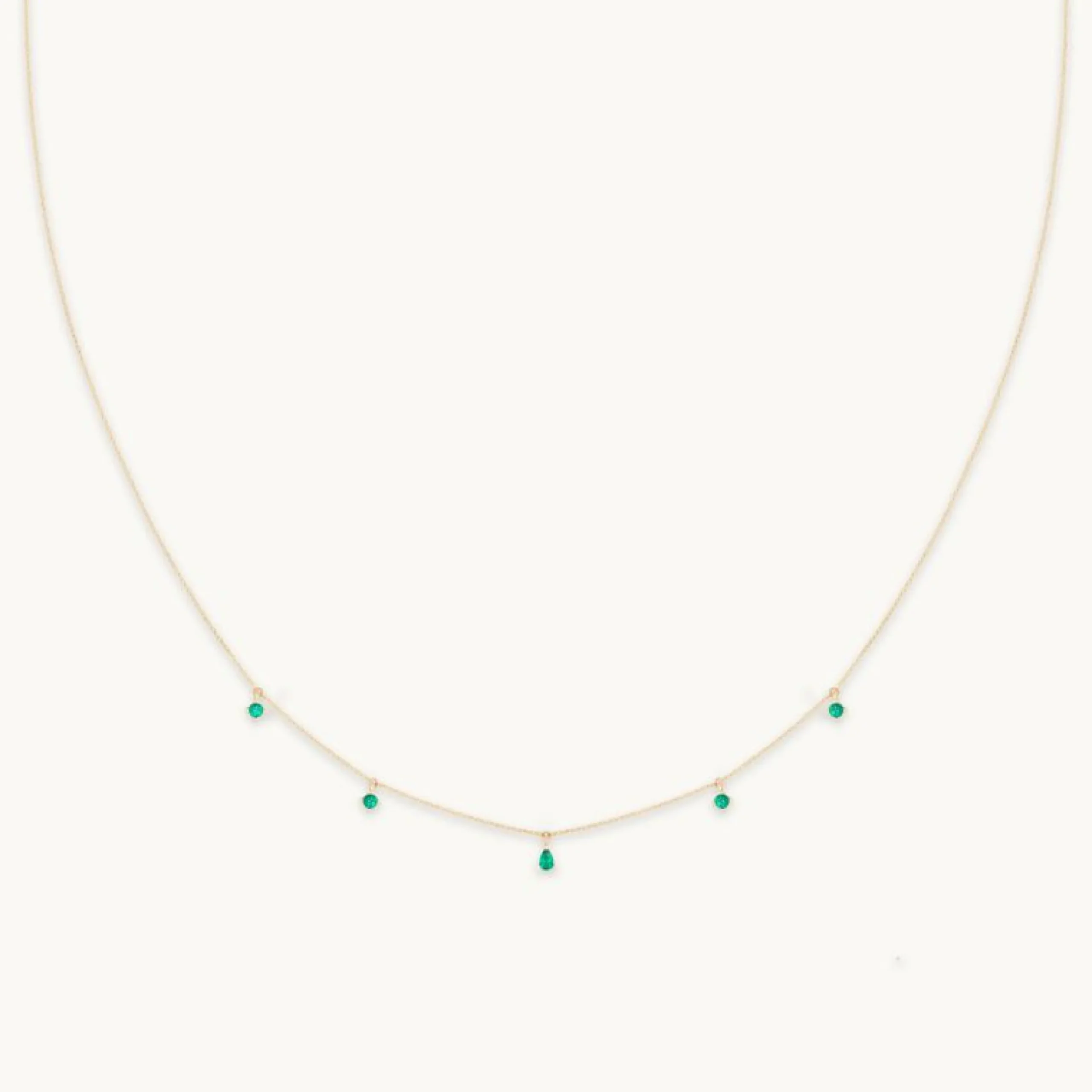 emerald_charm_necklace_in_0.webp Emerald Charm Necklace in Solid Gold