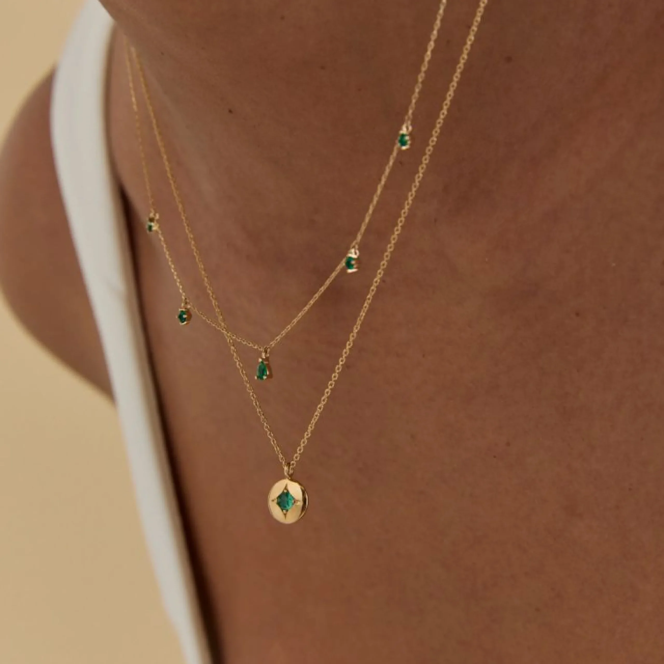 emerald_charm_necklace_in_2.webp Emerald Charm Necklace in Solid Gold