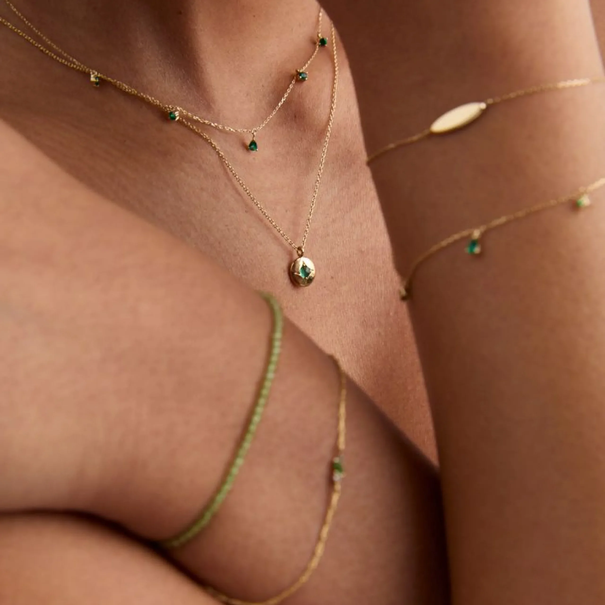 emerald_charm_necklace_in_3.webp Emerald Charm Necklace in Solid Gold