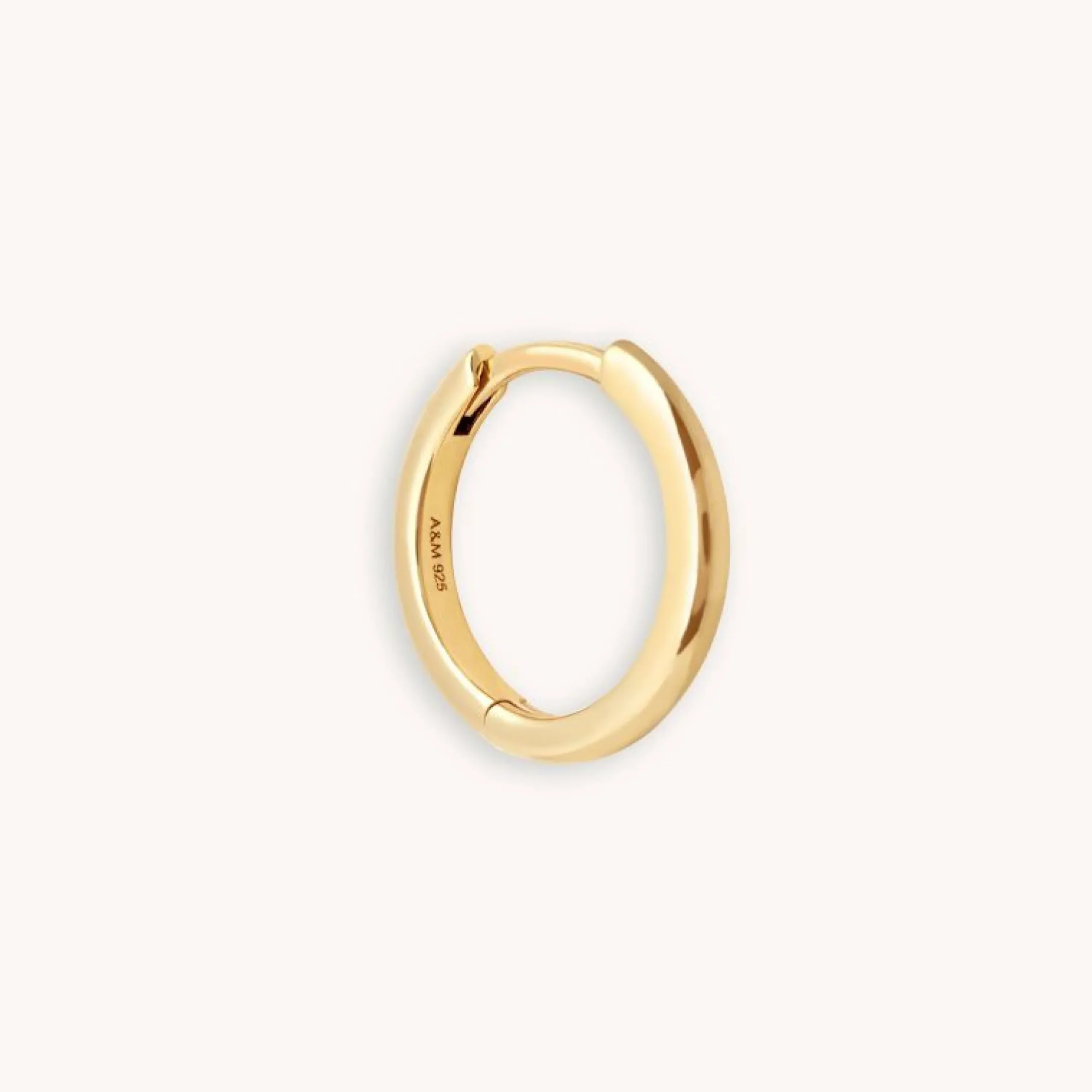 essential_mm_hoop_in_gold_0-2.webp Essential 11.5mm Hoop in Gold