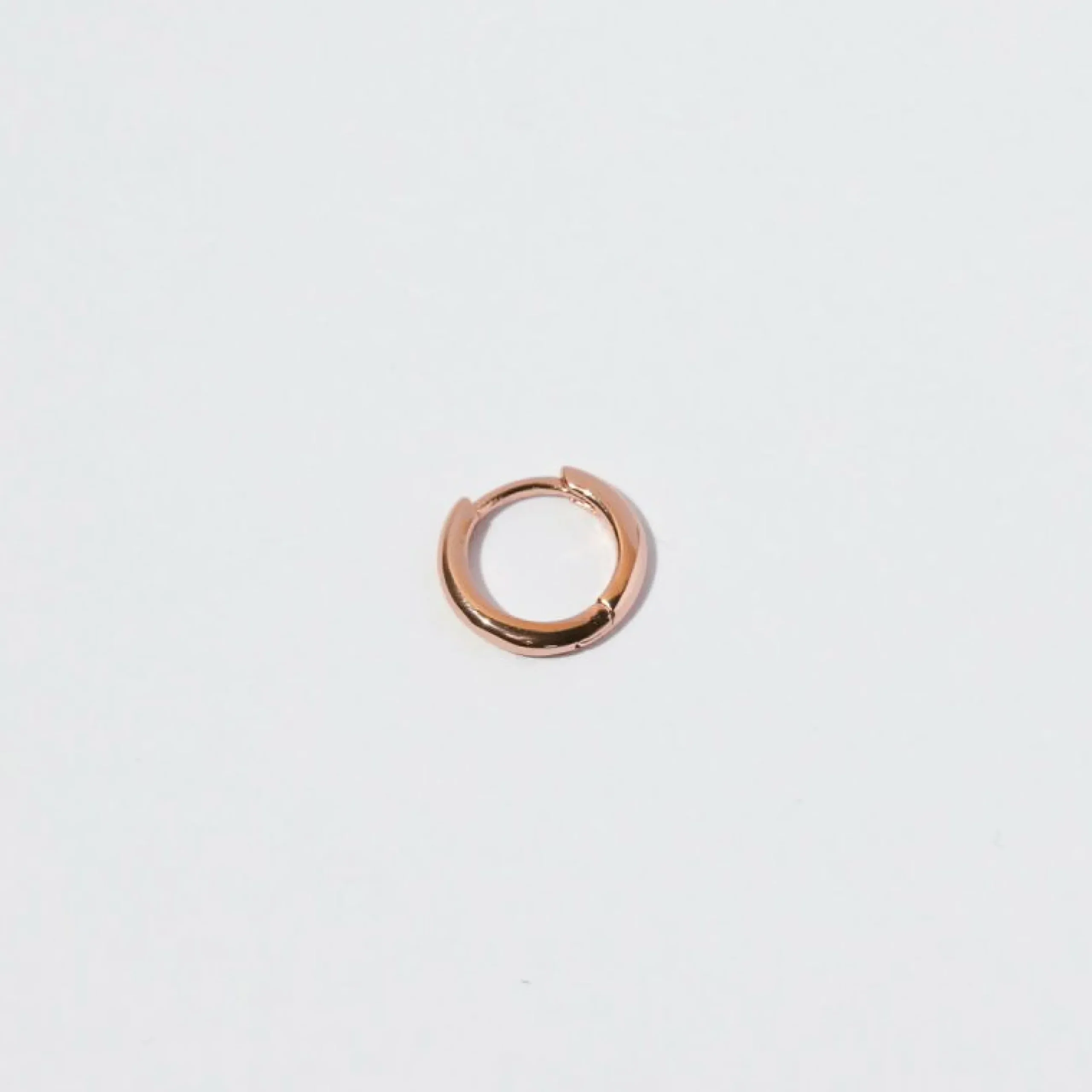 essential_mm_hoop_in_rose_2.webp Essential 8mm Hoop in Rose Gold