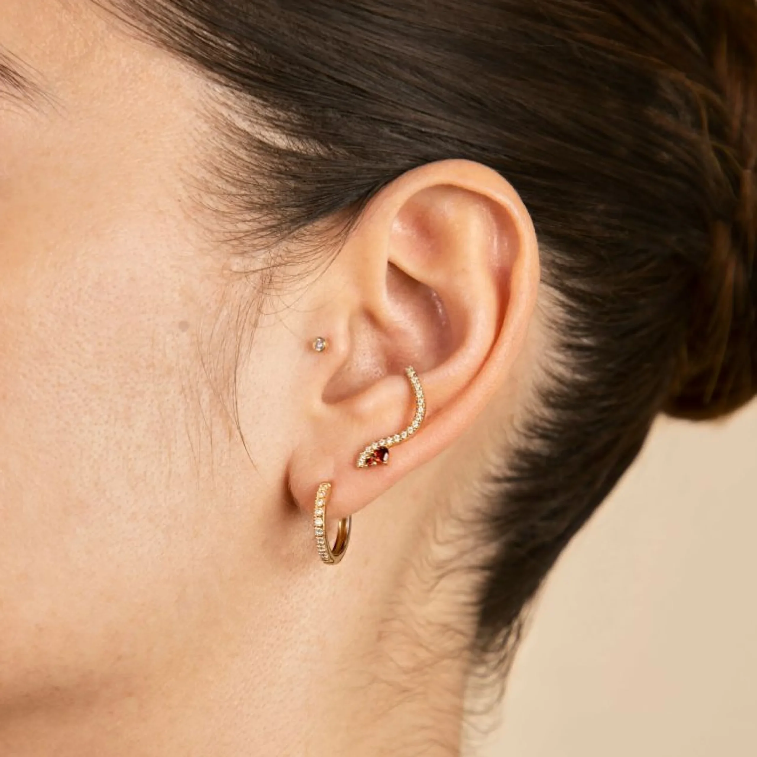 garnet_serpent_climber_st_4.webp Garnet Serpent Climber Studs in Gold
