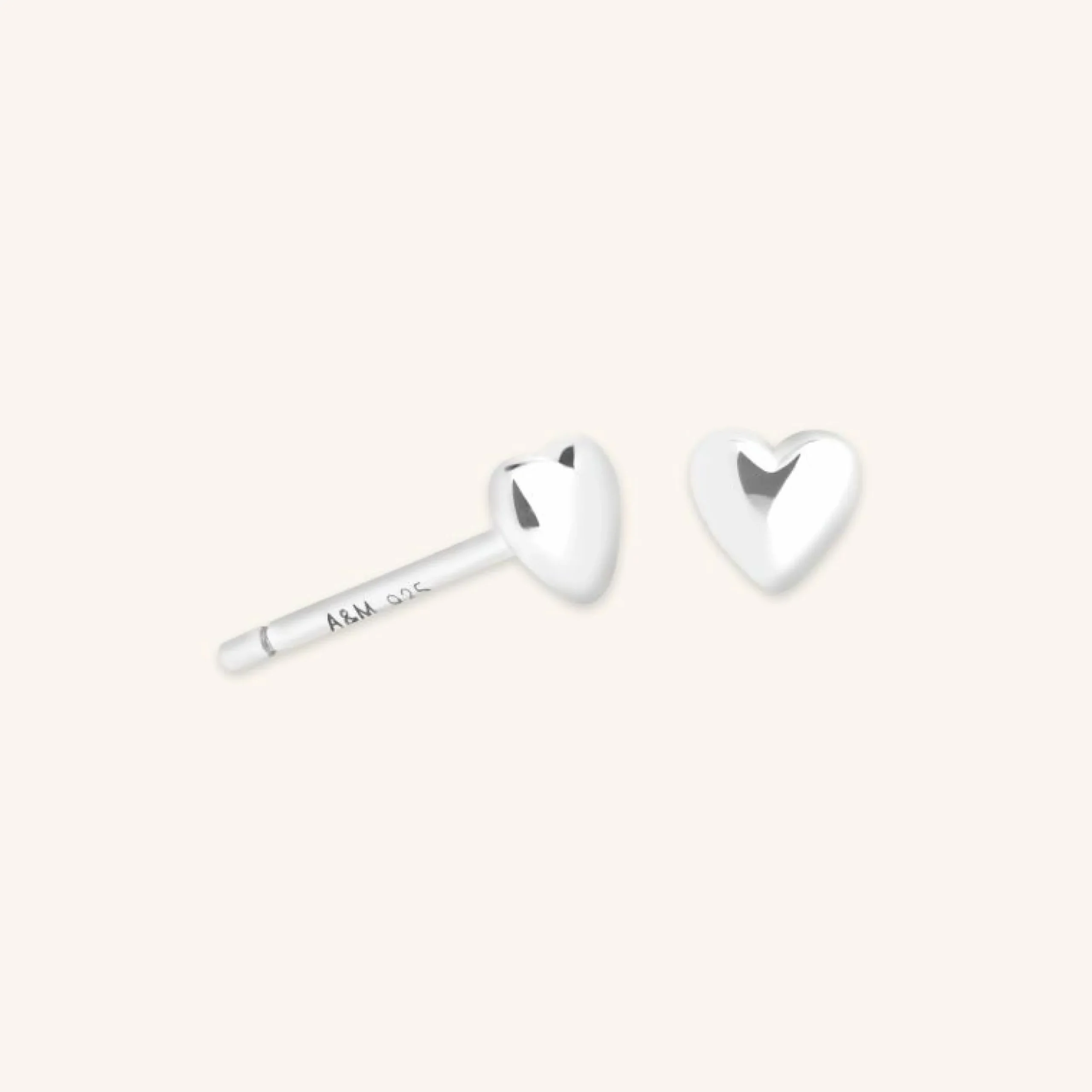 heart_stud_earrings_in_si_0.webp Heart Stud Earrings in Silver