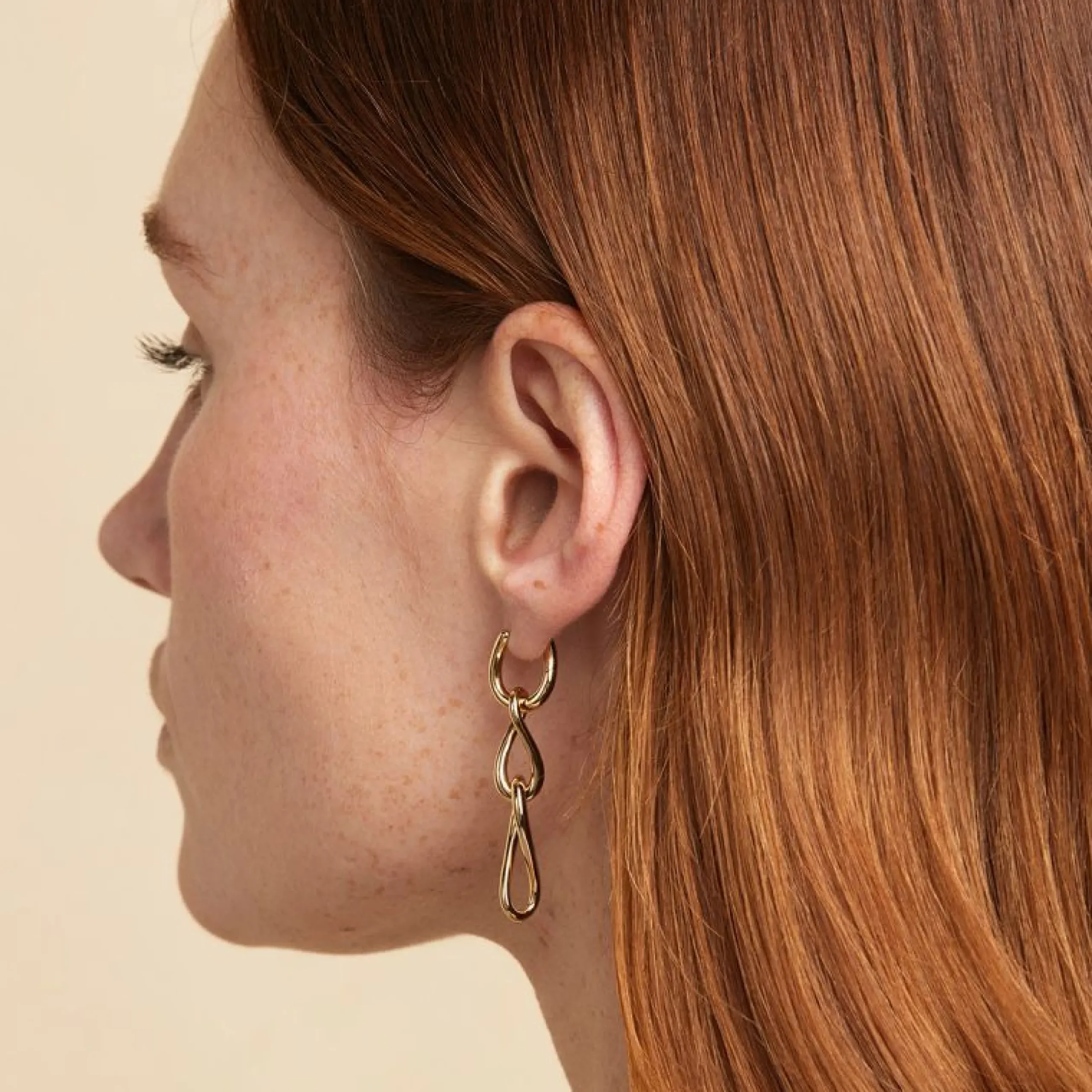 infinite_drop_stud_earrin_6.webp Infinite Drop Stud Earrings in Gold