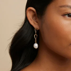 Infinite Pearl Drop Studs in Gold