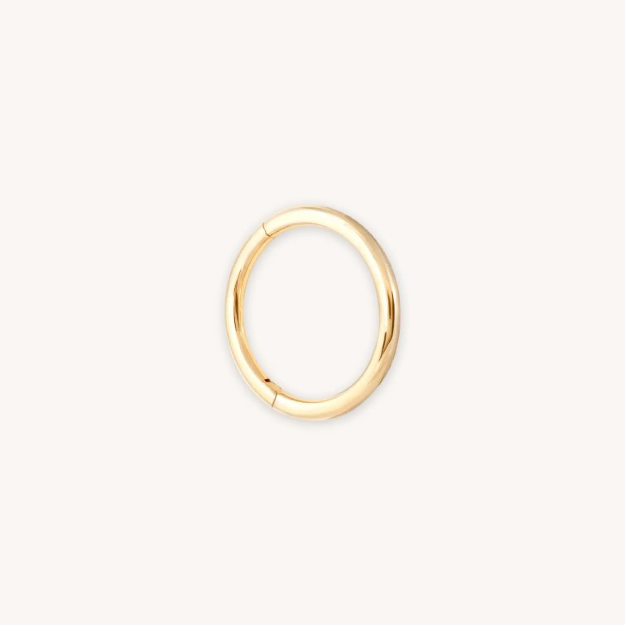 solid_gold_simple_piercin_0.webp Solid Gold Simple Piercing Hoop