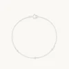 Topaz Charm Bracelet in Solid White Gold