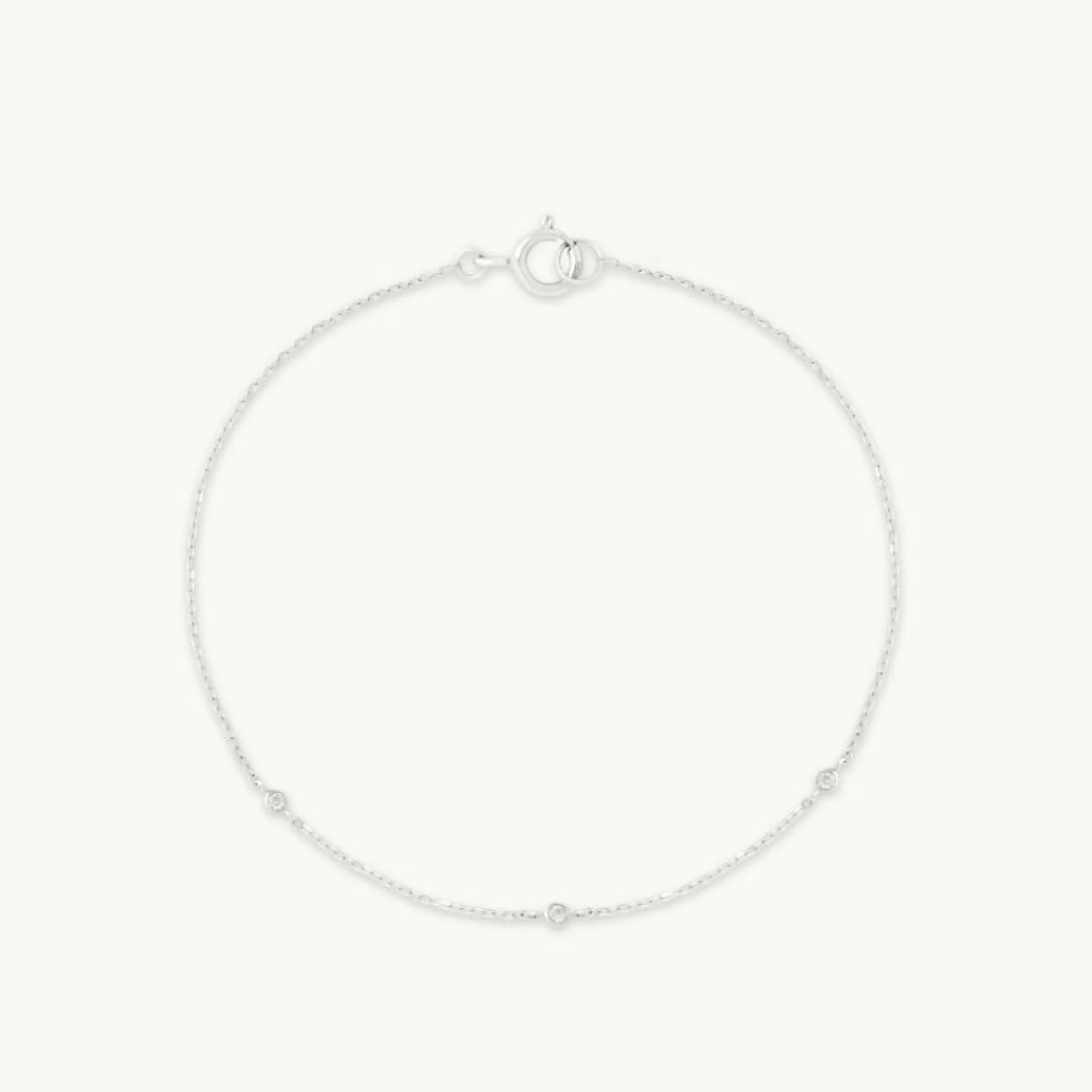 topaz_charm_bracelet_in_s_0-1.webp Topaz Charm Bracelet in Solid White Gold
