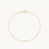 Topaz Charm Bracelet in Solid Gold