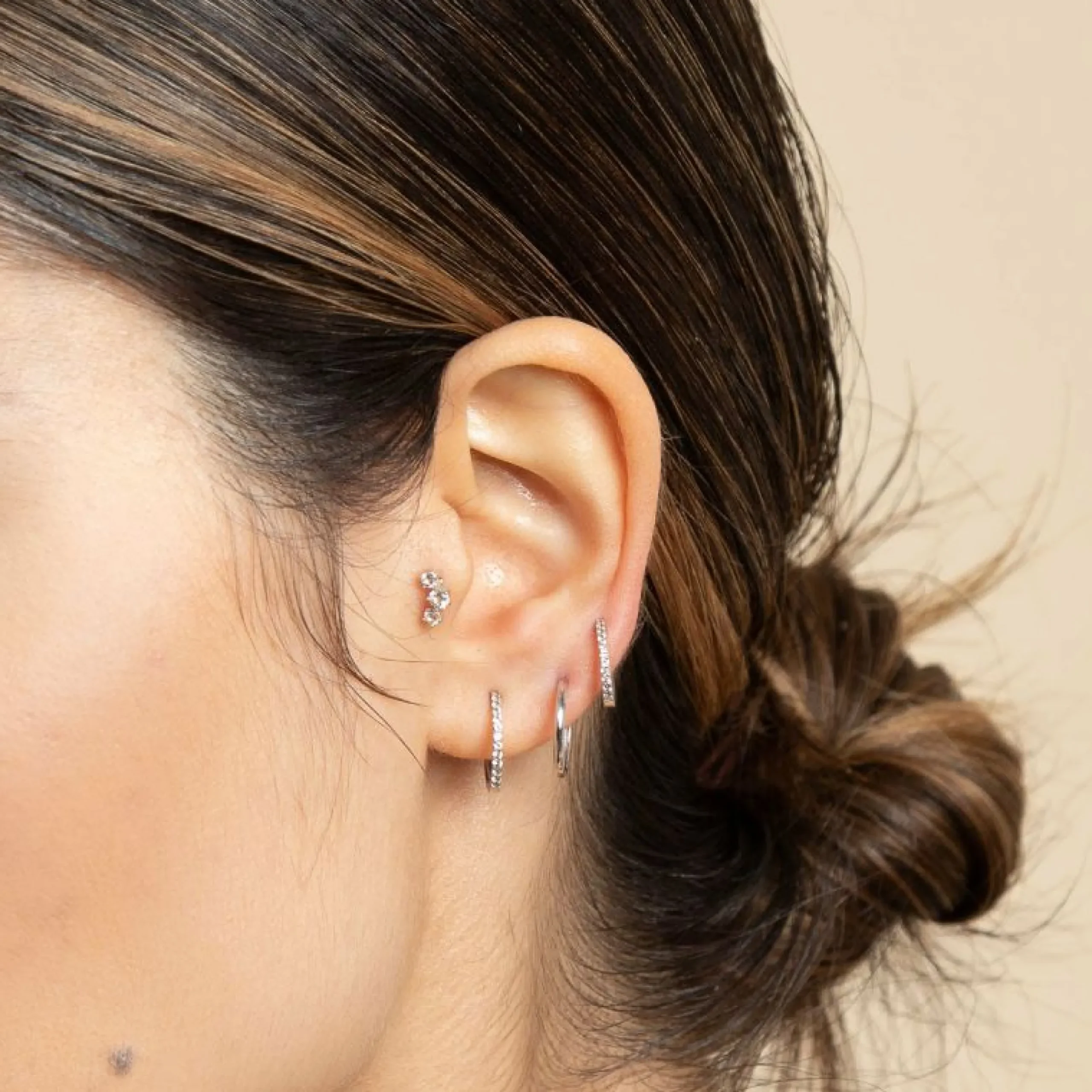 topaz_mm_hoops_in_solid_w_1.webp Topaz 12mm Hoops in Solid White Gold