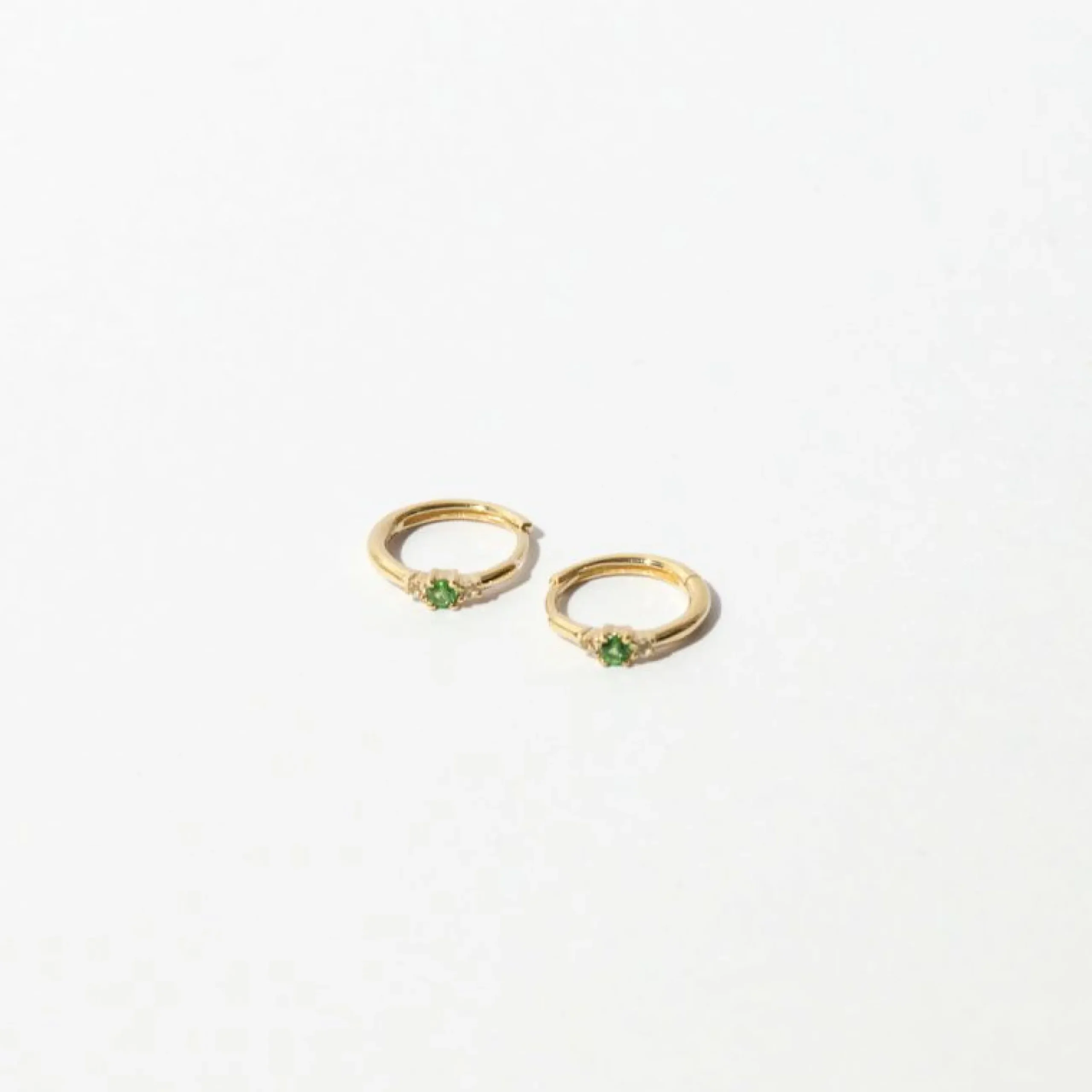tsavorite_hoops_in_solid__2.webp Tsavorite Hoops in Solid Gold