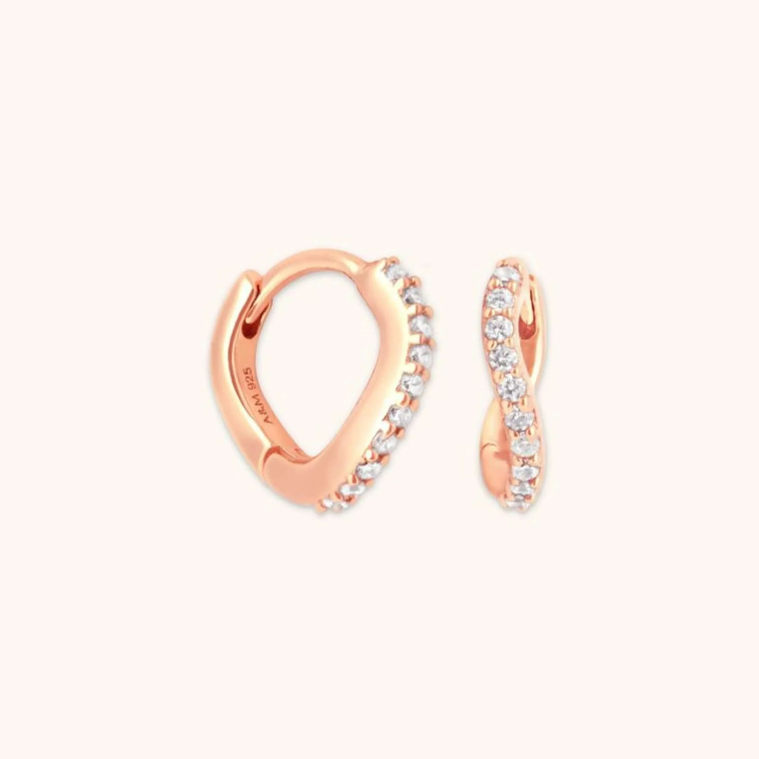 wave_crystal_huggies_in_r_0.webp Wave Crystal Huggies in Rose Gold