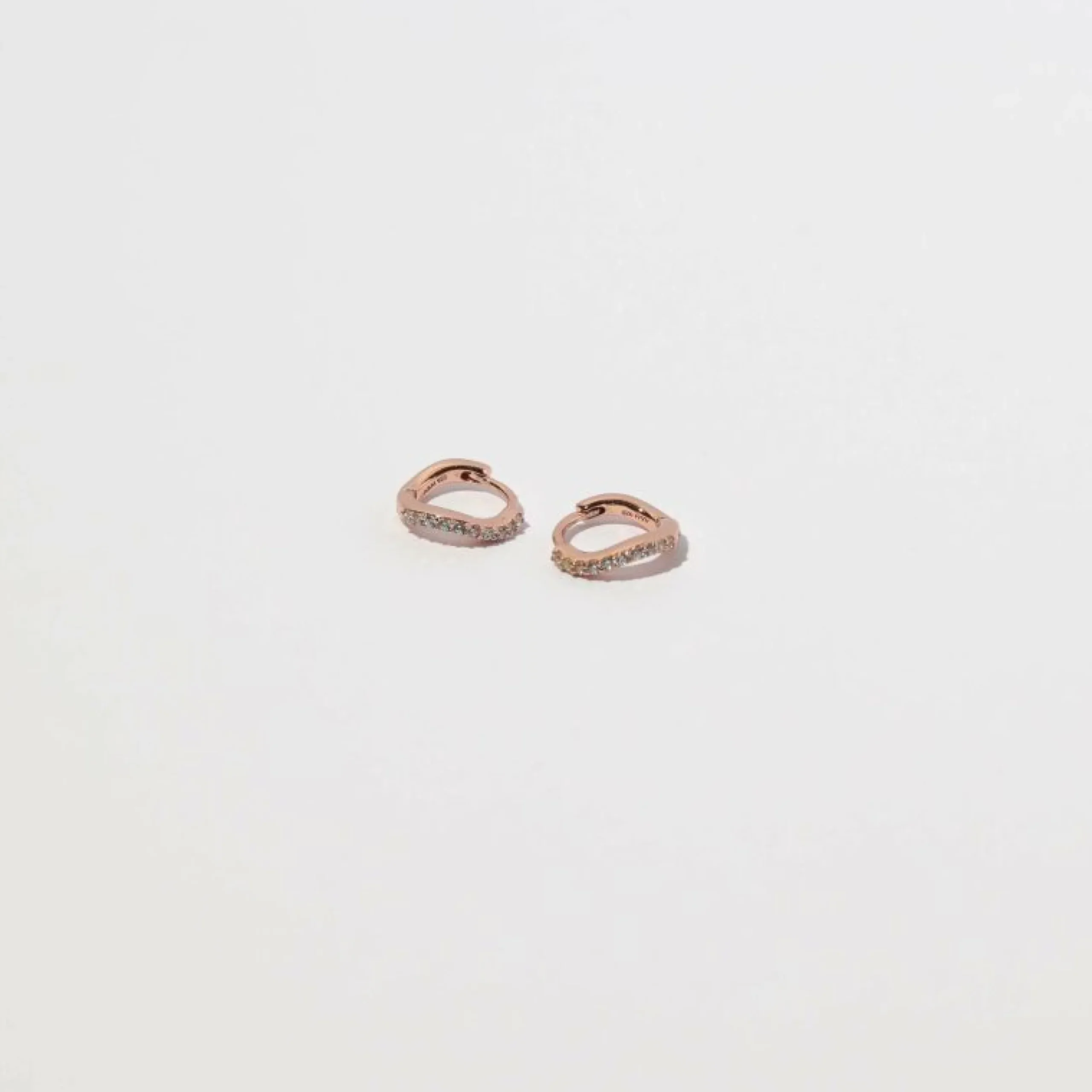 wave_crystal_huggies_in_r_2.webp Wave Crystal Huggies in Rose Gold