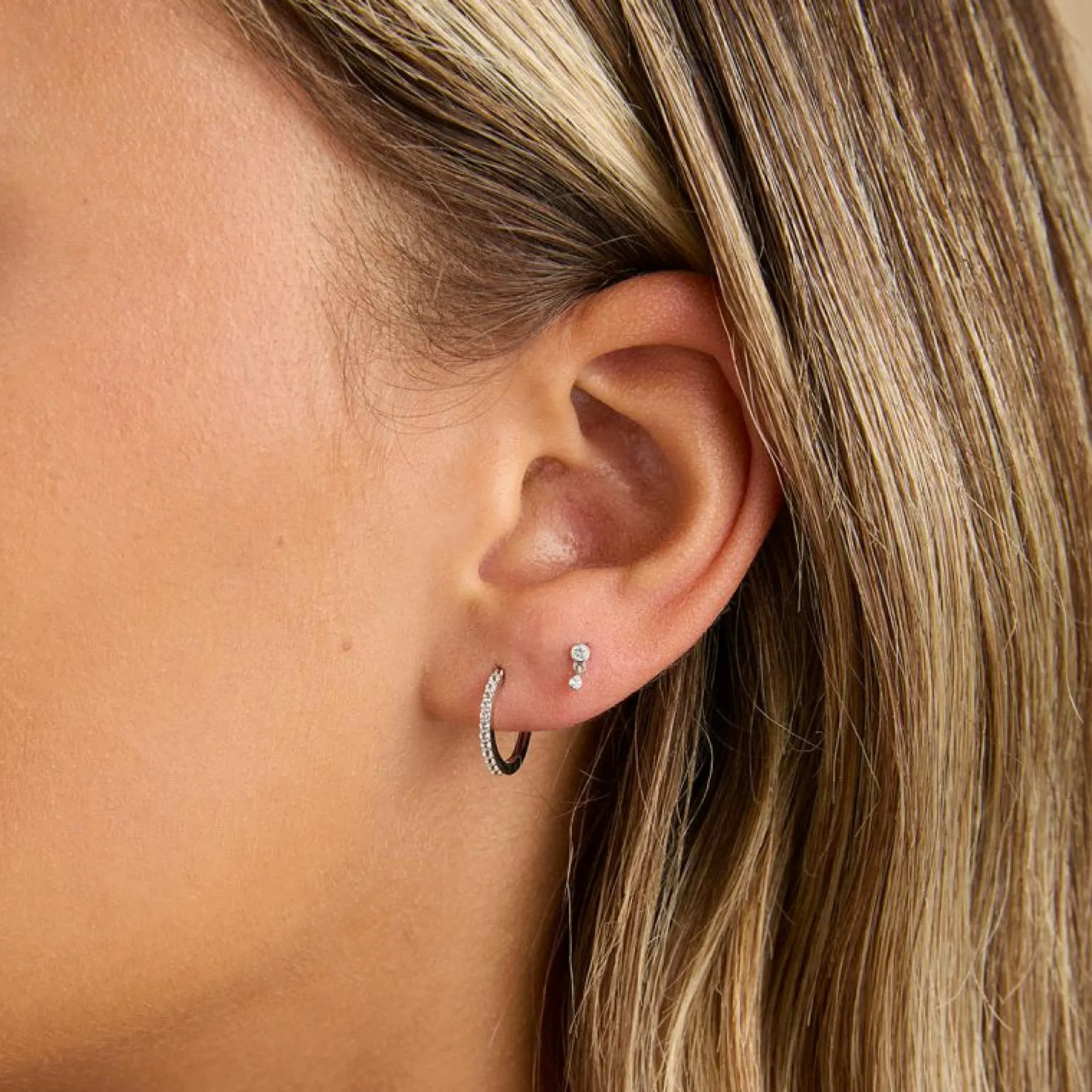 white_topaz_bezel_charm_p_1.webp White Topaz Bezel Charm Piercing Stud in Solid White Gold