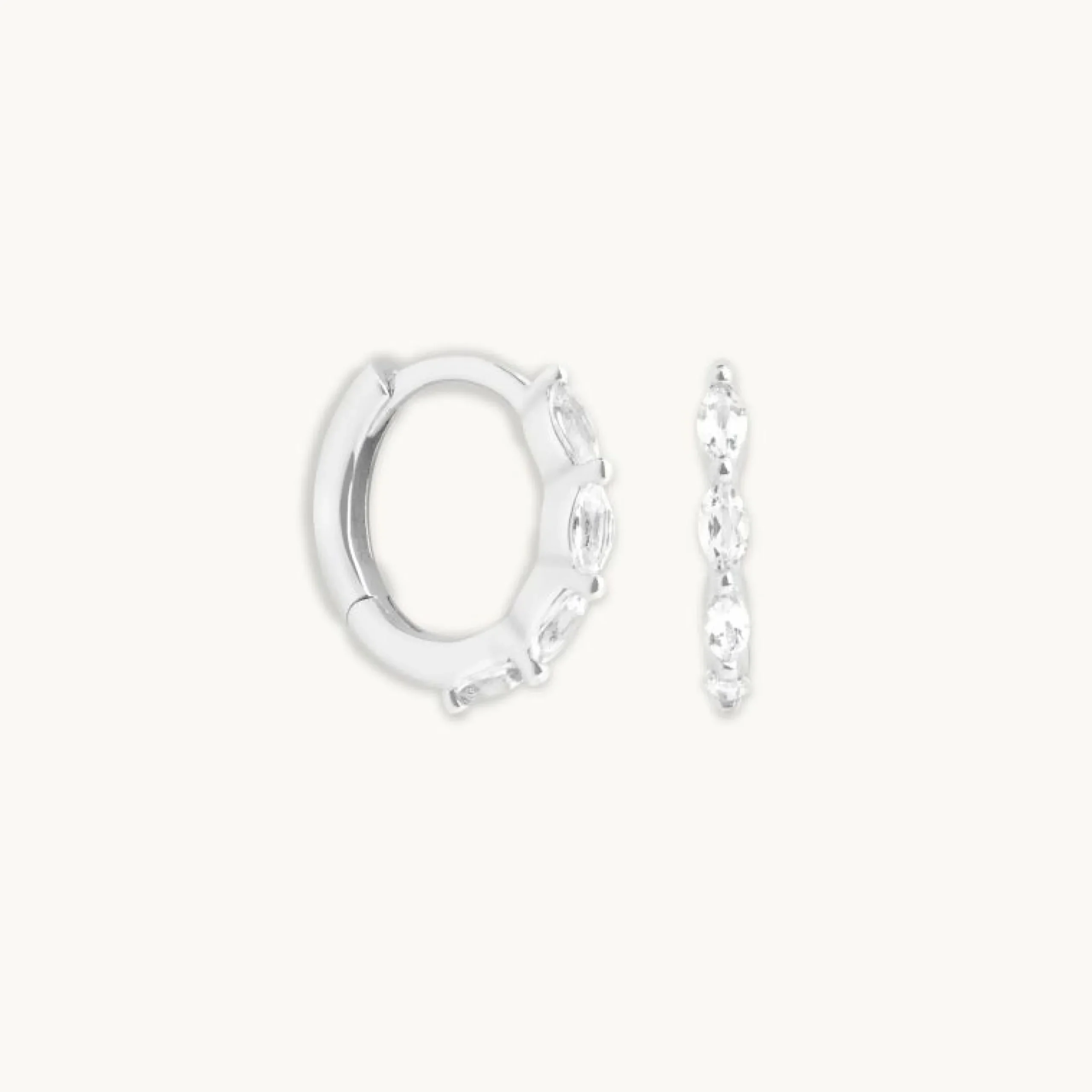 white_topaz_marquise_hugg_0-1.webp White Topaz Marquise Huggies in Solid White Gold