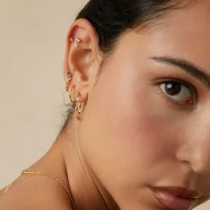 White Topaz Marquise Huggies in Solid Gold
