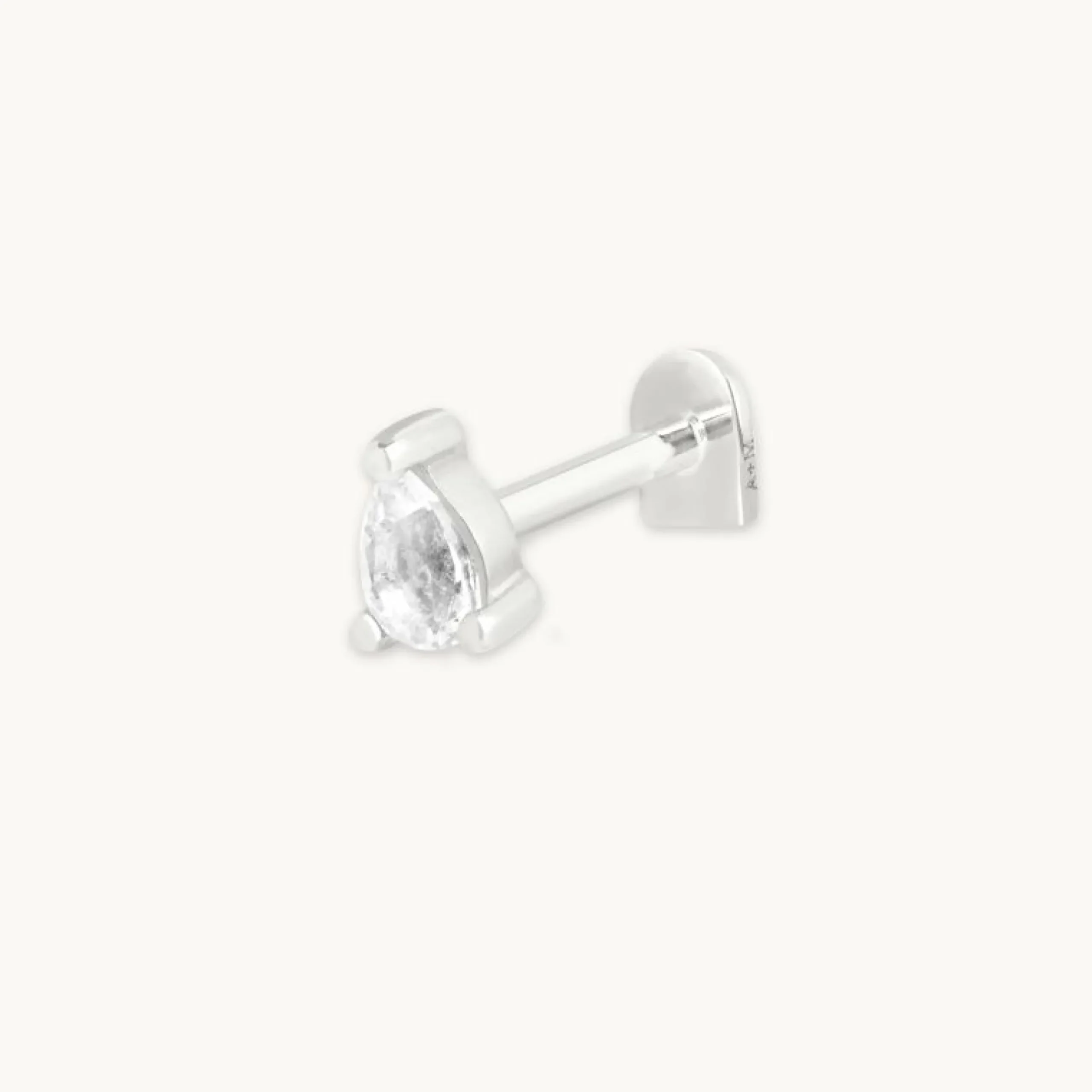 white_topaz_pear_piercing_0.webp White Topaz Pear Piercing Stud in Solid White Gold
